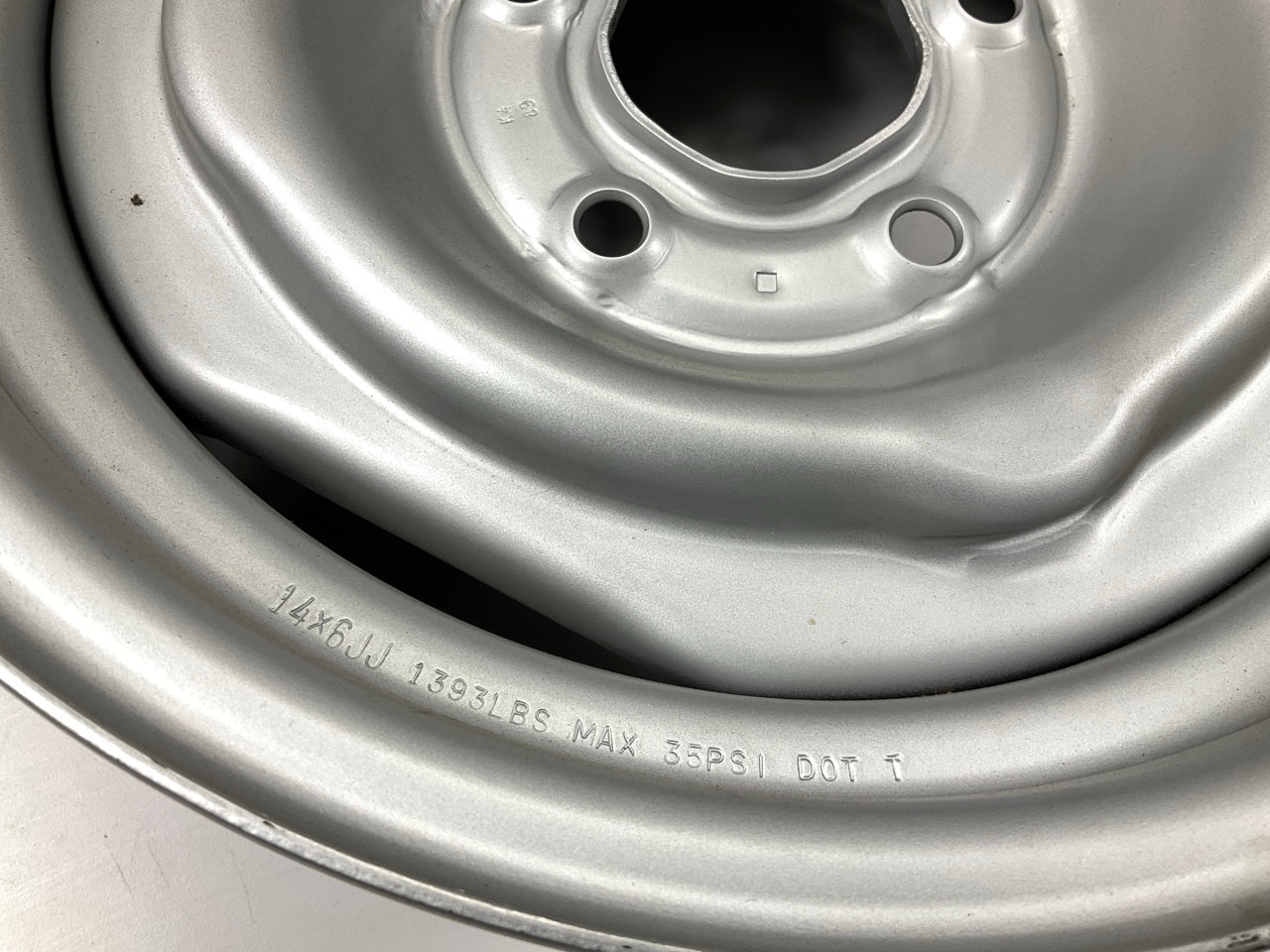 NOS 4-slot Steel Wheel 14''x6'', 5 X 4.5'' PCD 1967-1974 GM Chevy Buick Pontiac