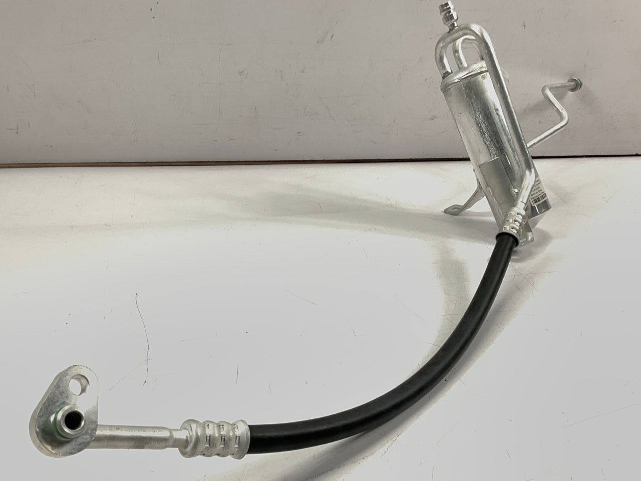 NEW - OUT OF BOX 83110 A/C Receiver Drier With Hose Assembly