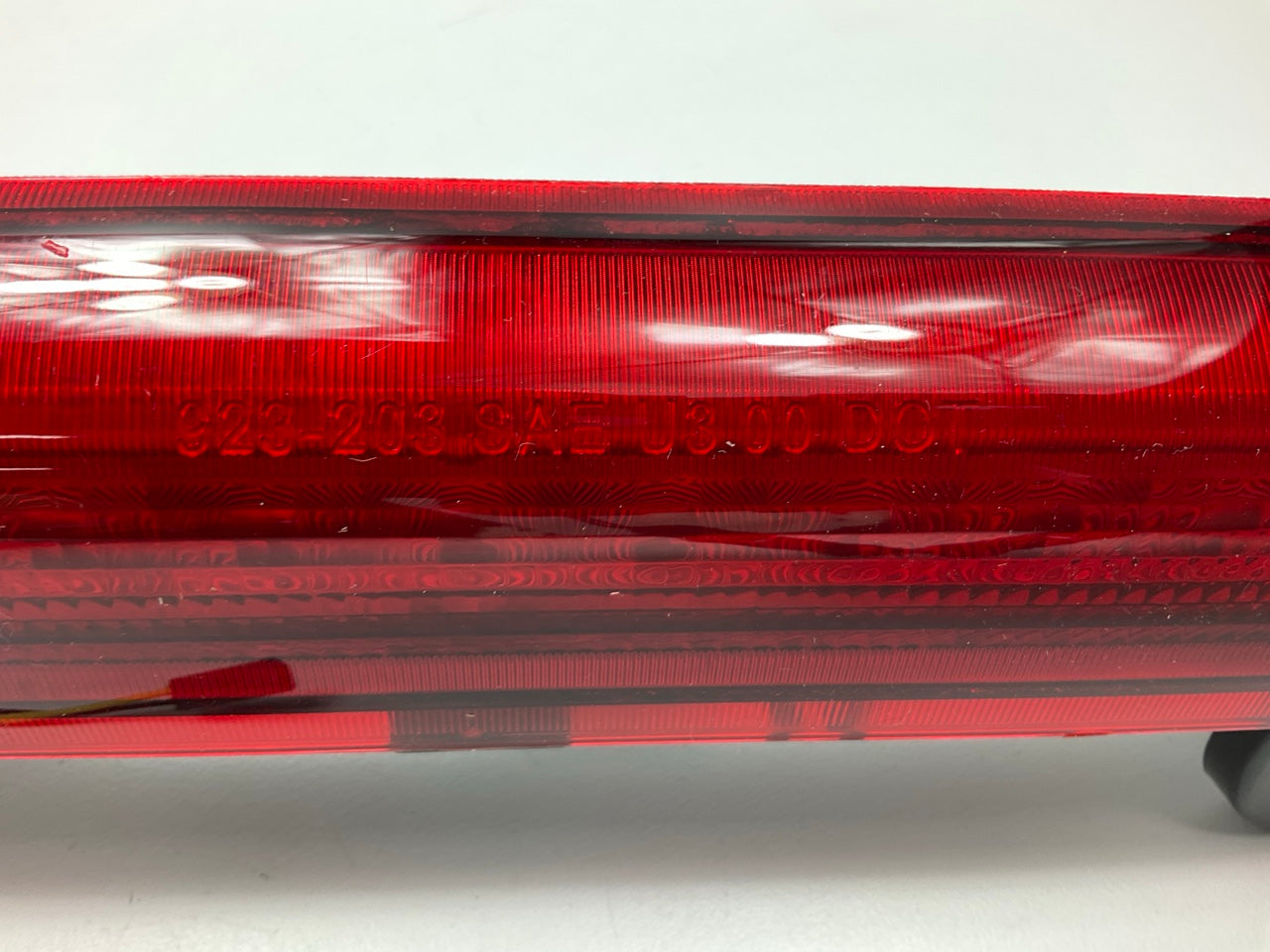 NEW - OUT OF BOX 923-203 Center High Mount Tail Light Lamp