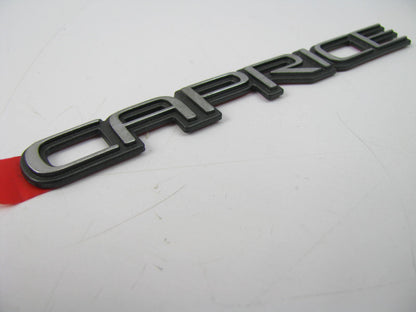 NEW - OUT OF BOX CAPRICE EMBLEM Name Plate Badge 5-1/2'' Long X 1/2'' High