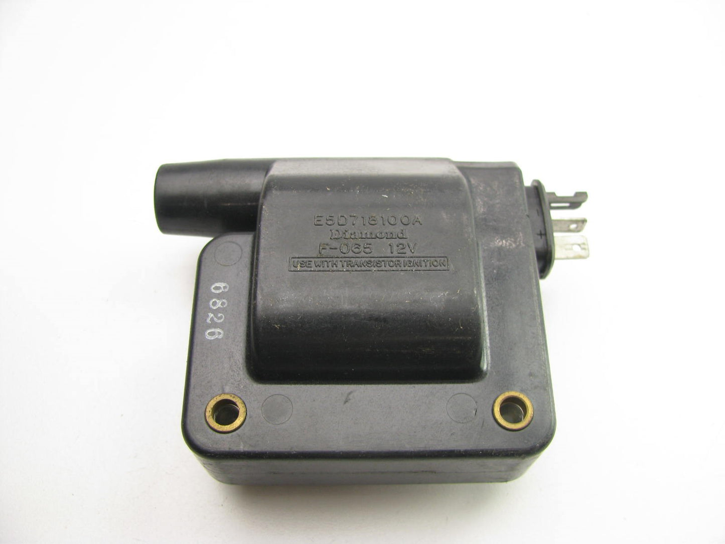 NEW - OUT OF BOX - OEM E5D7-18100-A Ignition Coil