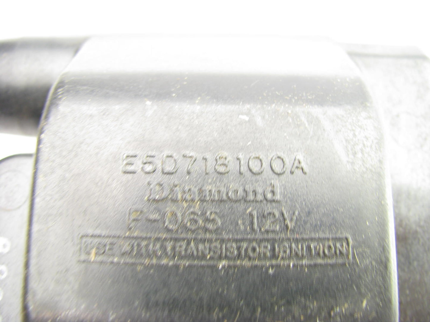 NEW - OUT OF BOX - OEM E5D7-18100-A Ignition Coil