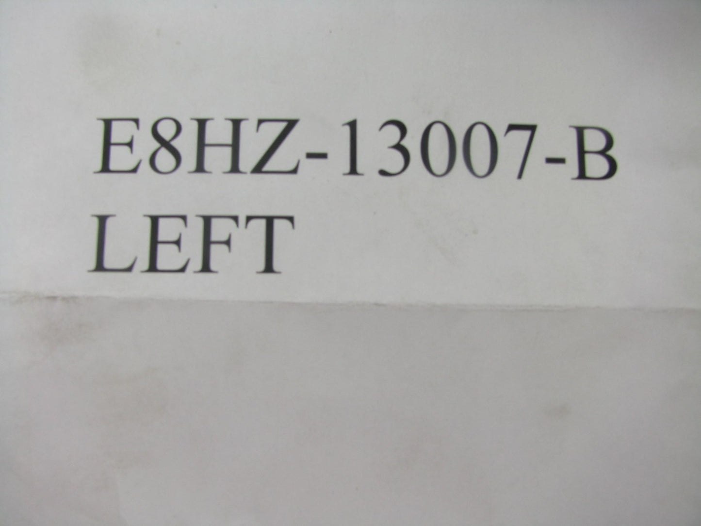NEW - Out Of Box E8HZ-13007-B-HOLE Front Left Headlight 1988-1990 Ford LA-LTA900
