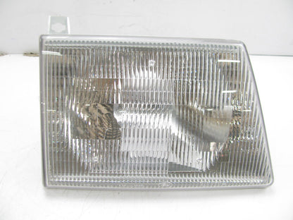 NEW - BUT SCRATCHED - OUT OF BOX OEM Ford F2UZ-13007-A Right Headlight Head Lamp