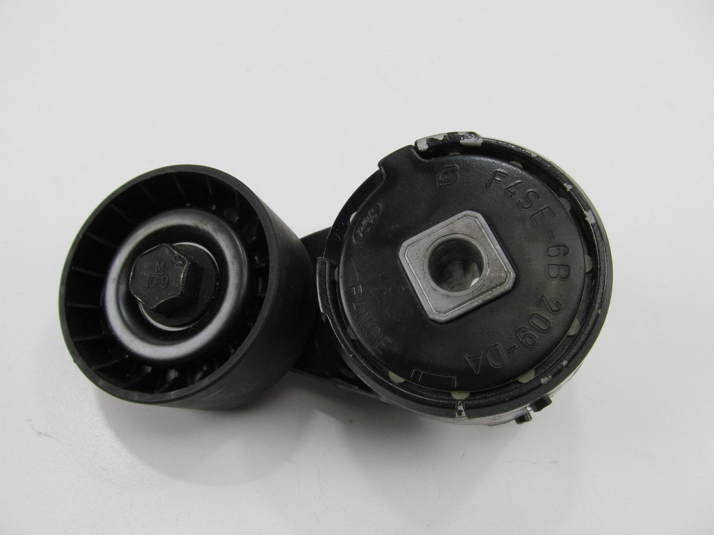 NEW UNBOXED OEM Ford F4SE-6B209-DA Belt Tensioner Assembly