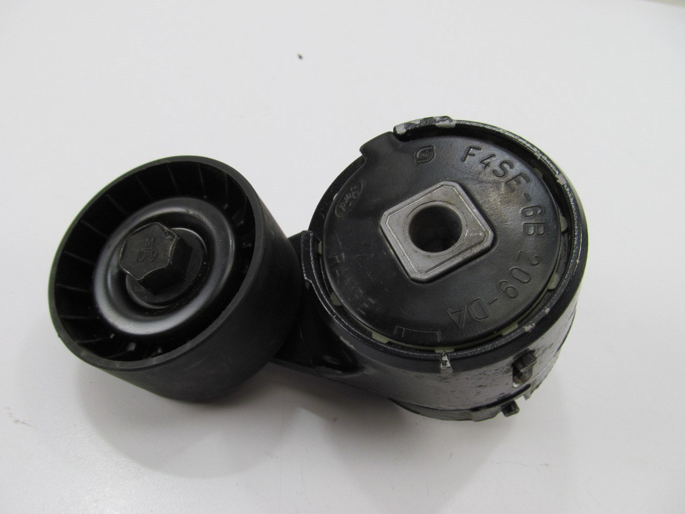 NEW UNBOXED OEM Ford F4SE-6B209-DA Belt Tensioner Assembly