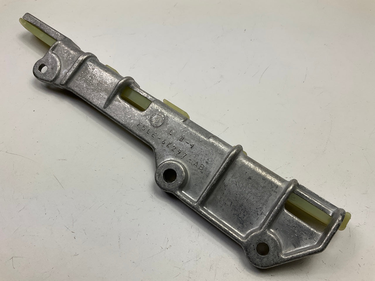 NEW UNBOXED OEM Ford F5LE-6K297-AB Engine Left Timing Chain Guide