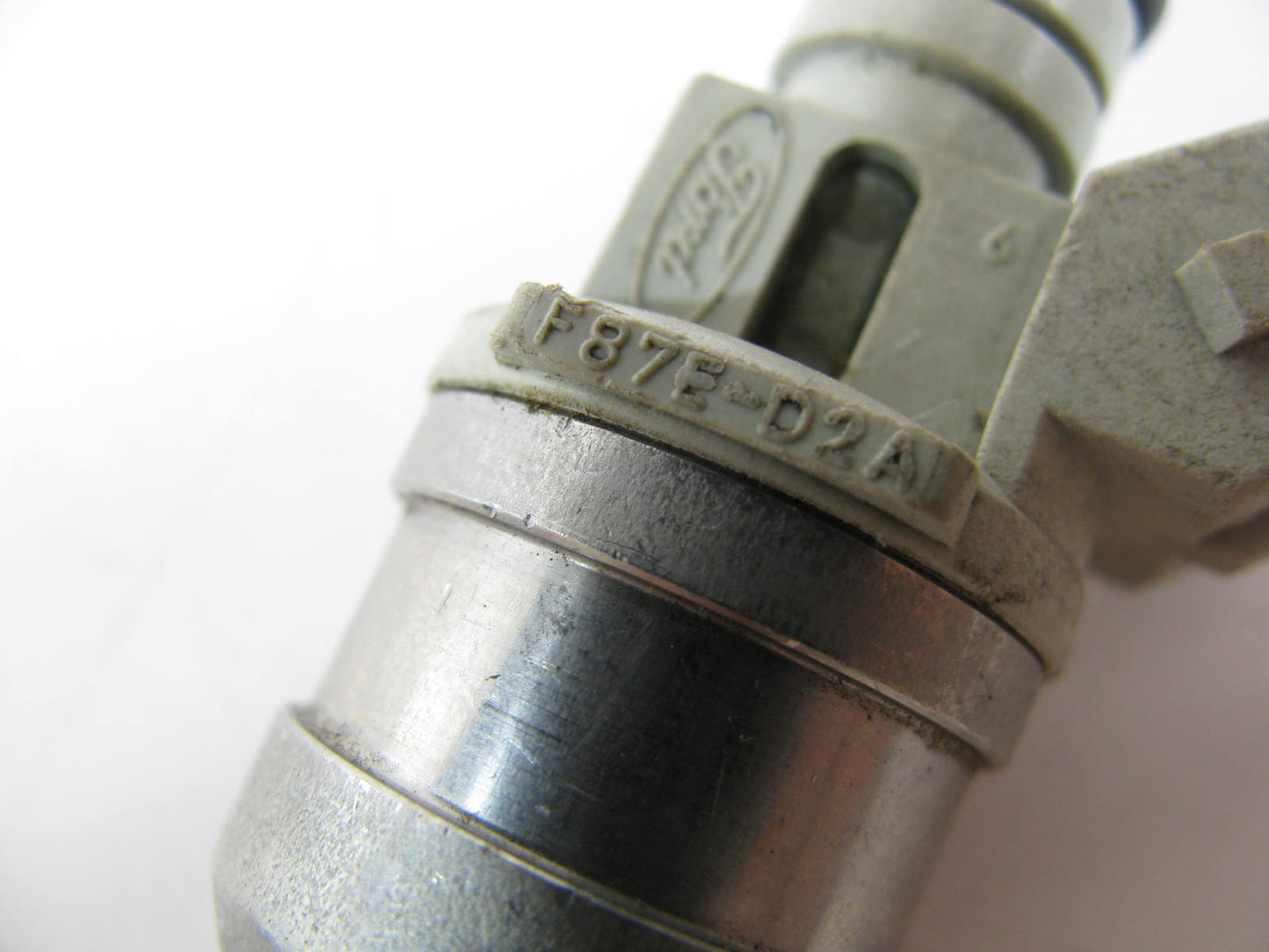 NEW - OUT OF BOX - OEM Ford F87E-D2A Fuel Injector