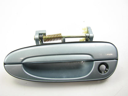 NEW - OUT OF BOX - FRONT LEFT Exterior Door Handle BLUE - 1996-2002 Mazda 626