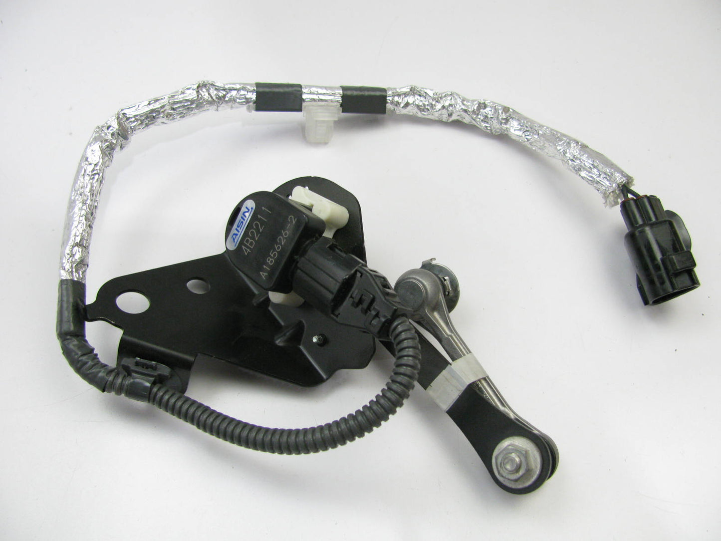 NEW - OUT OF BOX Genuine AISIN HST-041 Suspension Ride Height Sensor Rear Left