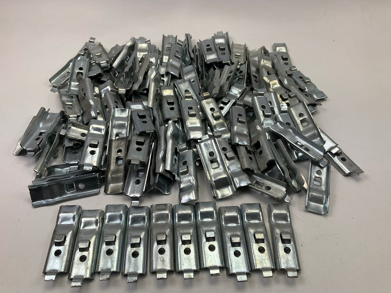 130 Pcs - Pacific Shelf Support Clips Brackets For Metal Shelves, Used