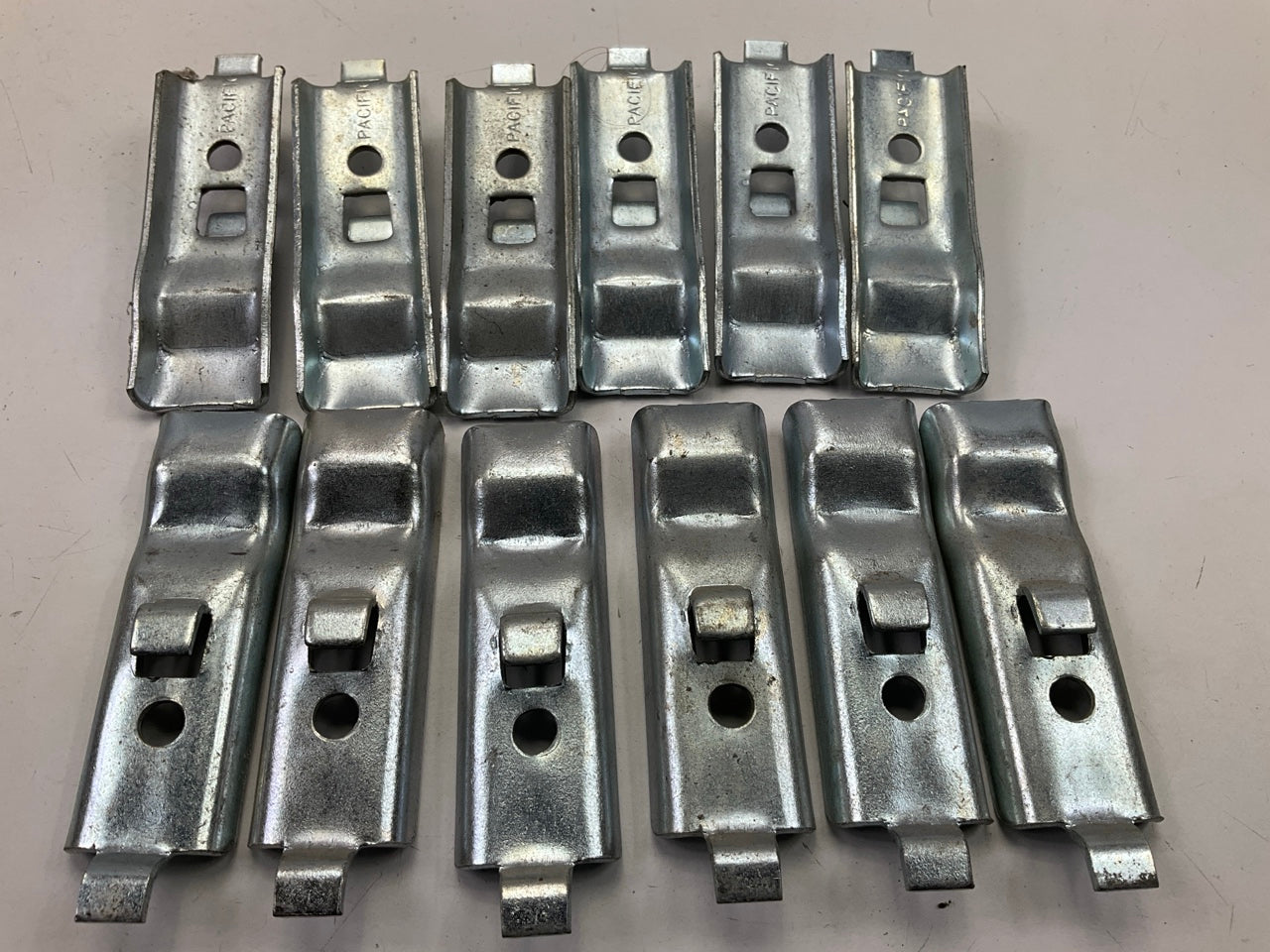 130 Pcs - Pacific Shelf Support Clips Brackets For Metal Shelves, Used
