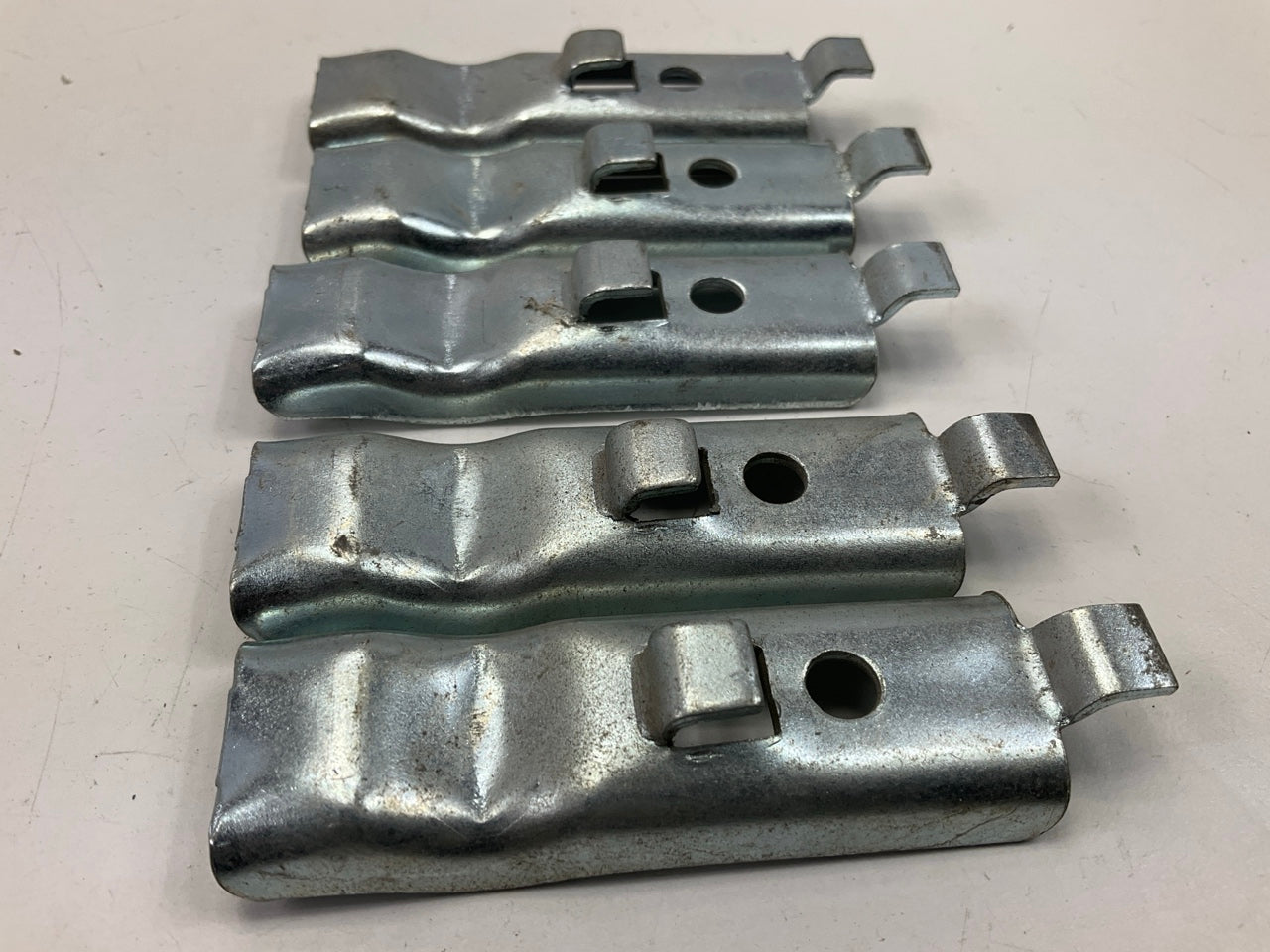 130 Pcs - Pacific Shelf Support Clips Brackets For Metal Shelves, Used