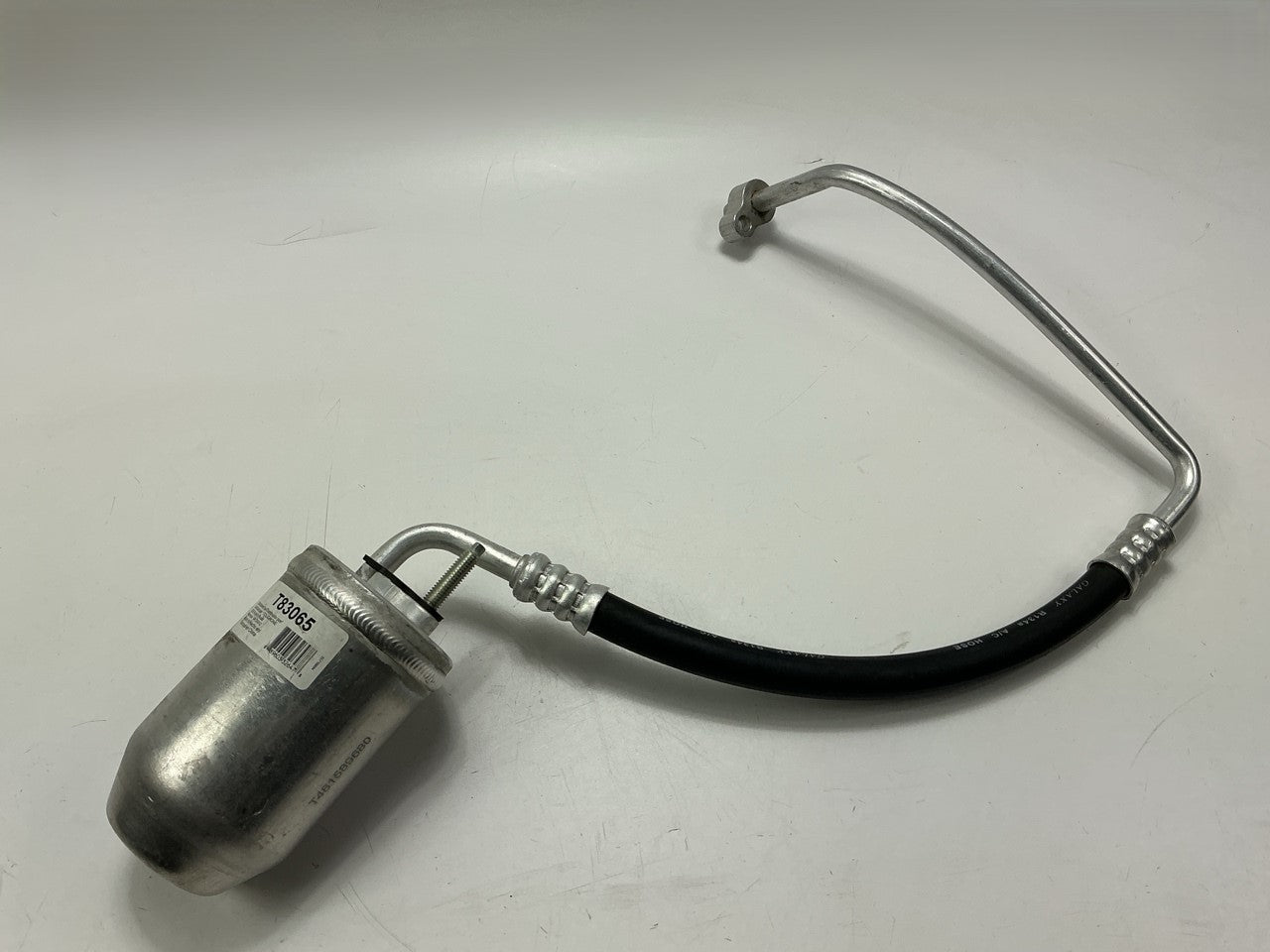 NEW - OUT OF BOX T83065 A/C Receiver Drier With Hose Assembly