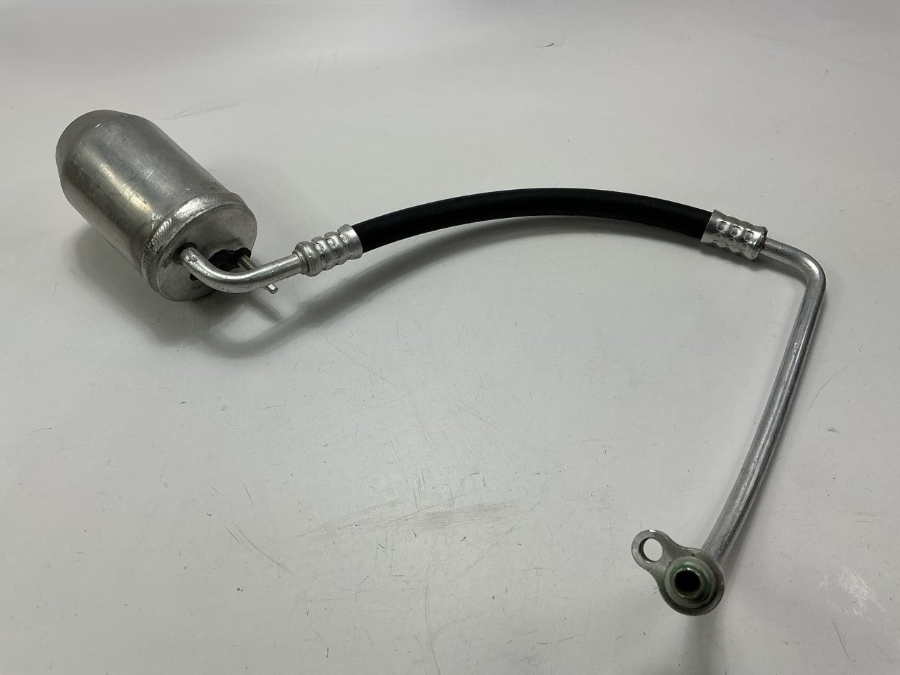 NEW - OUT OF BOX T83065 A/C Receiver Drier With Hose Assembly