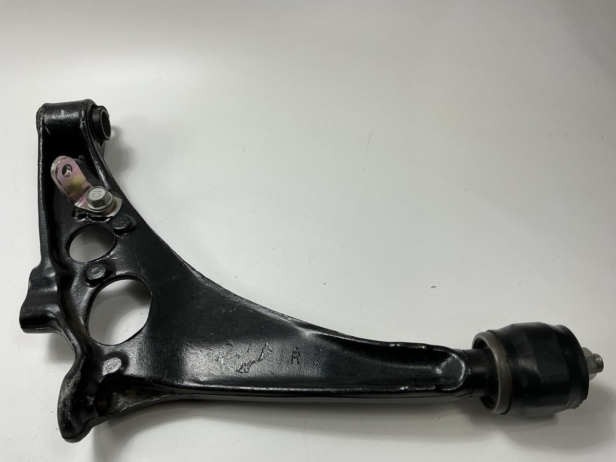 NEW UNBOXED OEM TA04-34-300F Front Right Lower Control Arm 95-02 Mazda Millenia