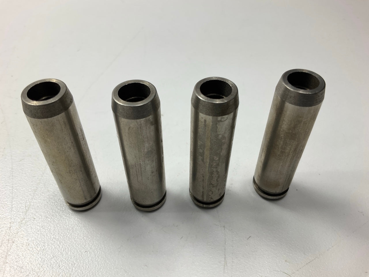 (4) New Unboxed VG709 Exhaust Valve Guides MD000471