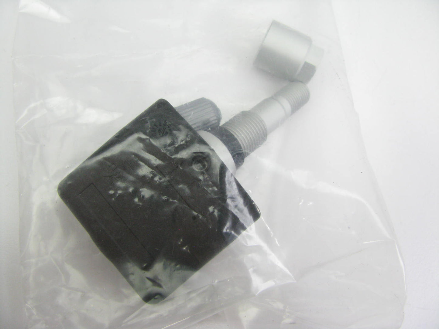 NEW - OUT OF BOX -XVBX1F01 TPMS Tire Pressure Monitor Sensor