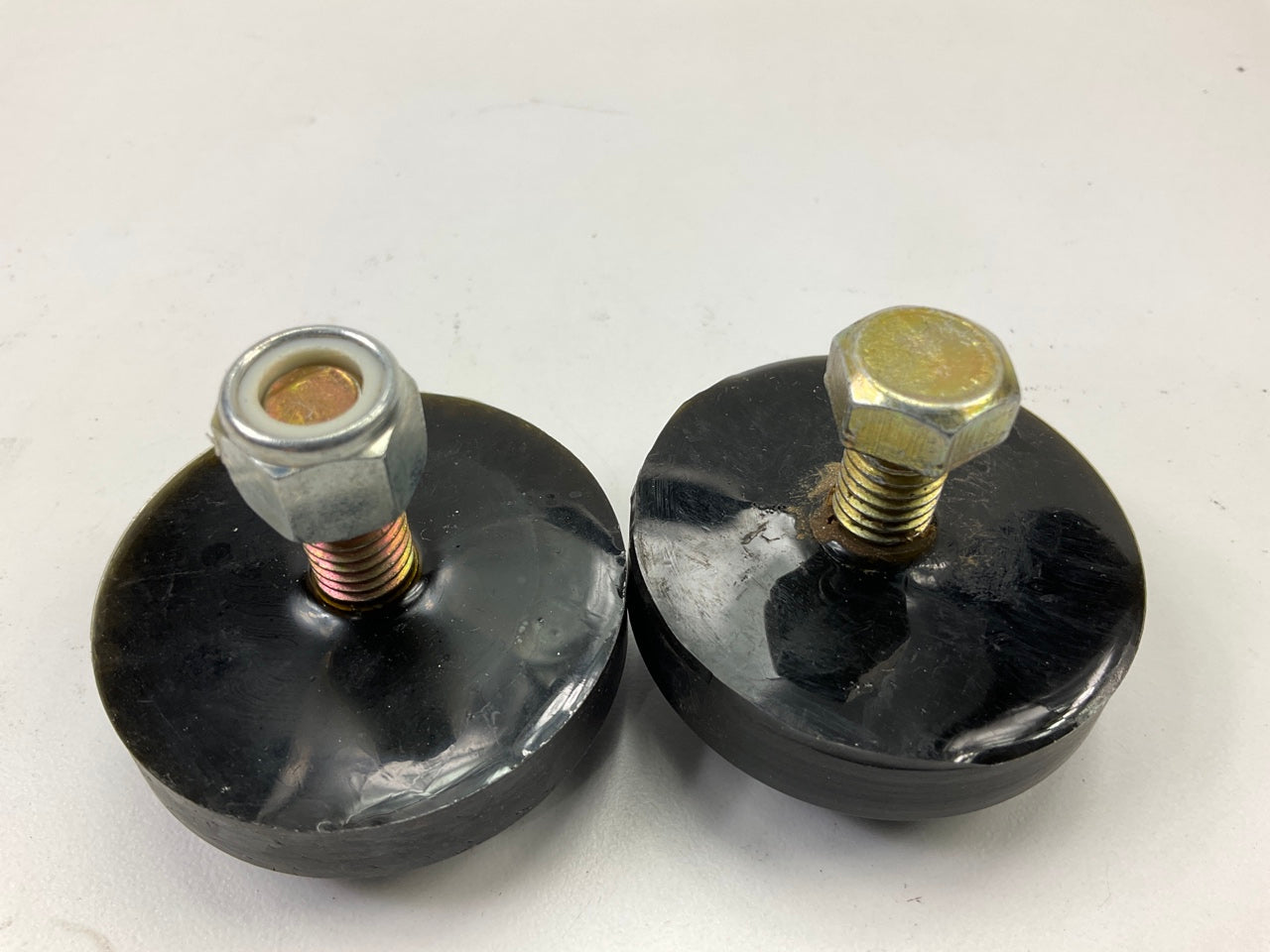 Superior 20-0110B 11/16'' Tall Polyurethane Bump Stops, Pair, Button Style, Black