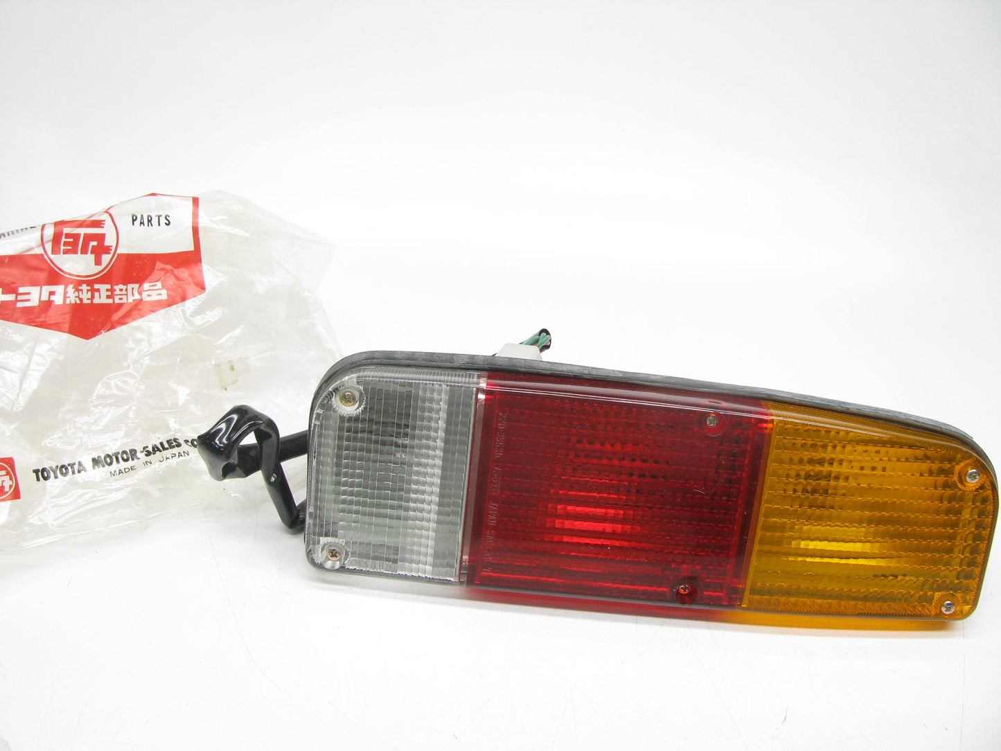 NOS OEM Toyota Rear Taillight Housing & Lens 220-33531