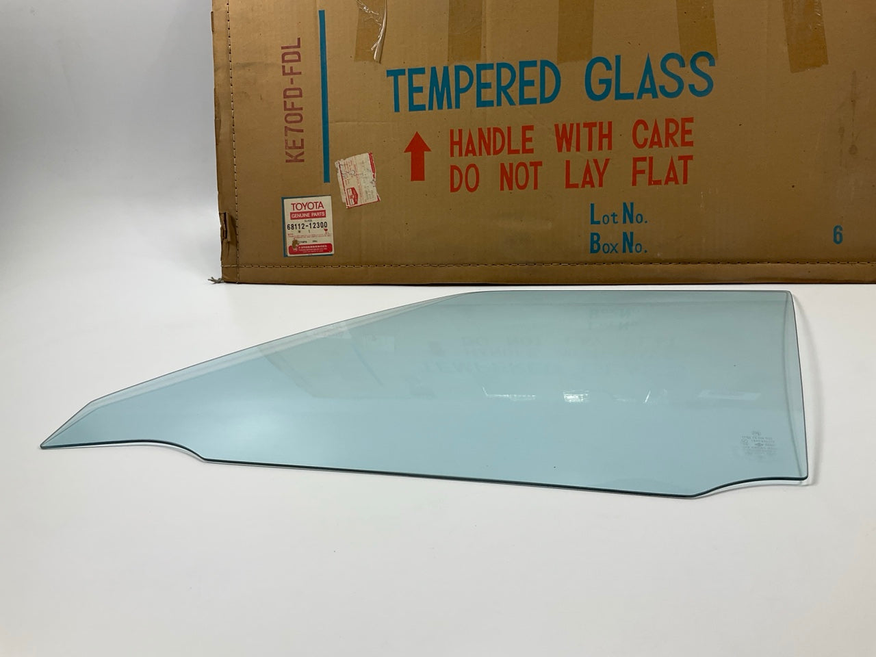 NOS OEM Toyota 68112-12300 Front Left Door Glass - 1980-1982 Corolla AE70 4-Door