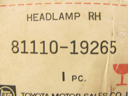 NOS - OEM Toyota 81110-19265 TOSHIBA Headlight Headlamp Bulb & Retainer