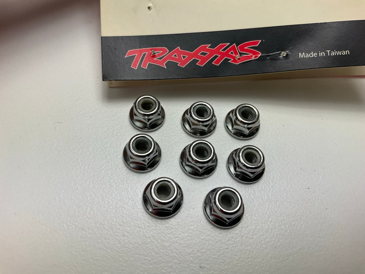 Traxxas 3647 4mm Steel Flanged Serrated Nylon Locknut (8)