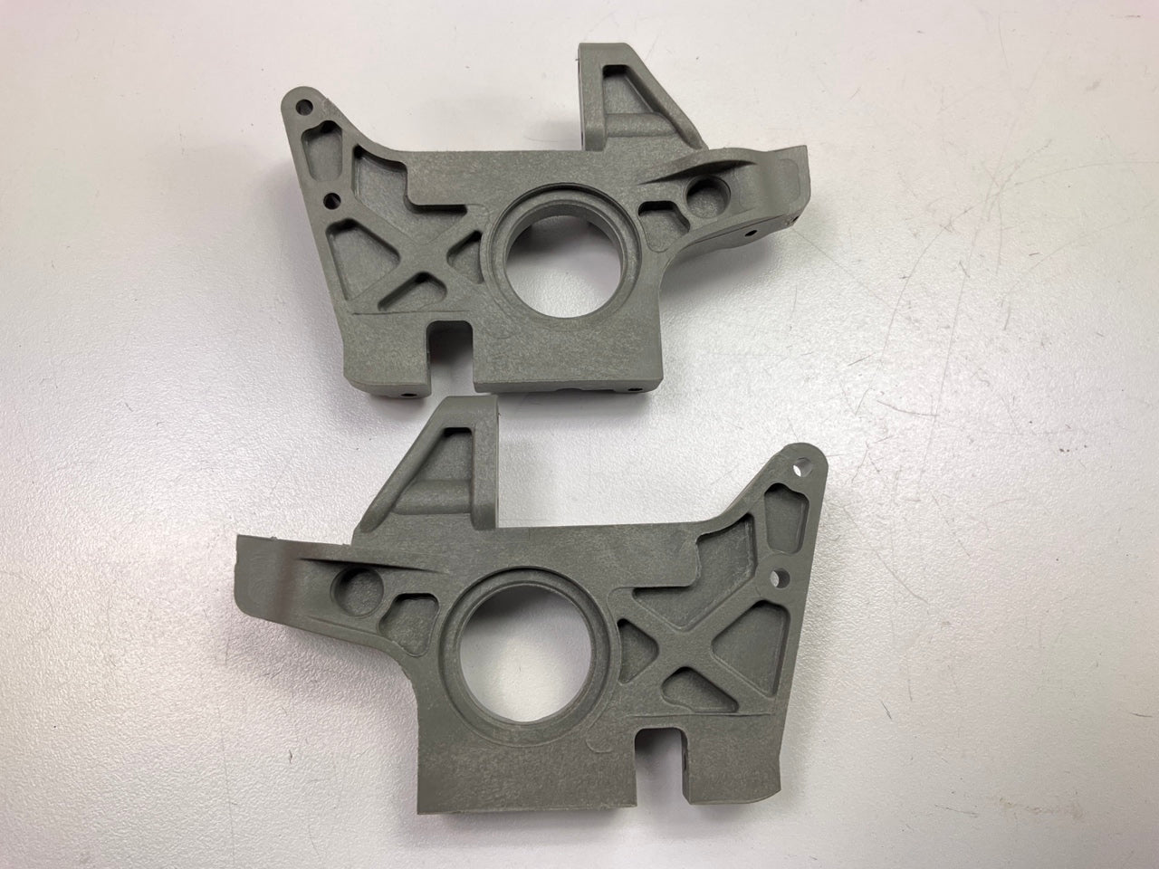 Traxxas 4930R Bulkheads (Left & Right) (front) (grey) T-Maxx