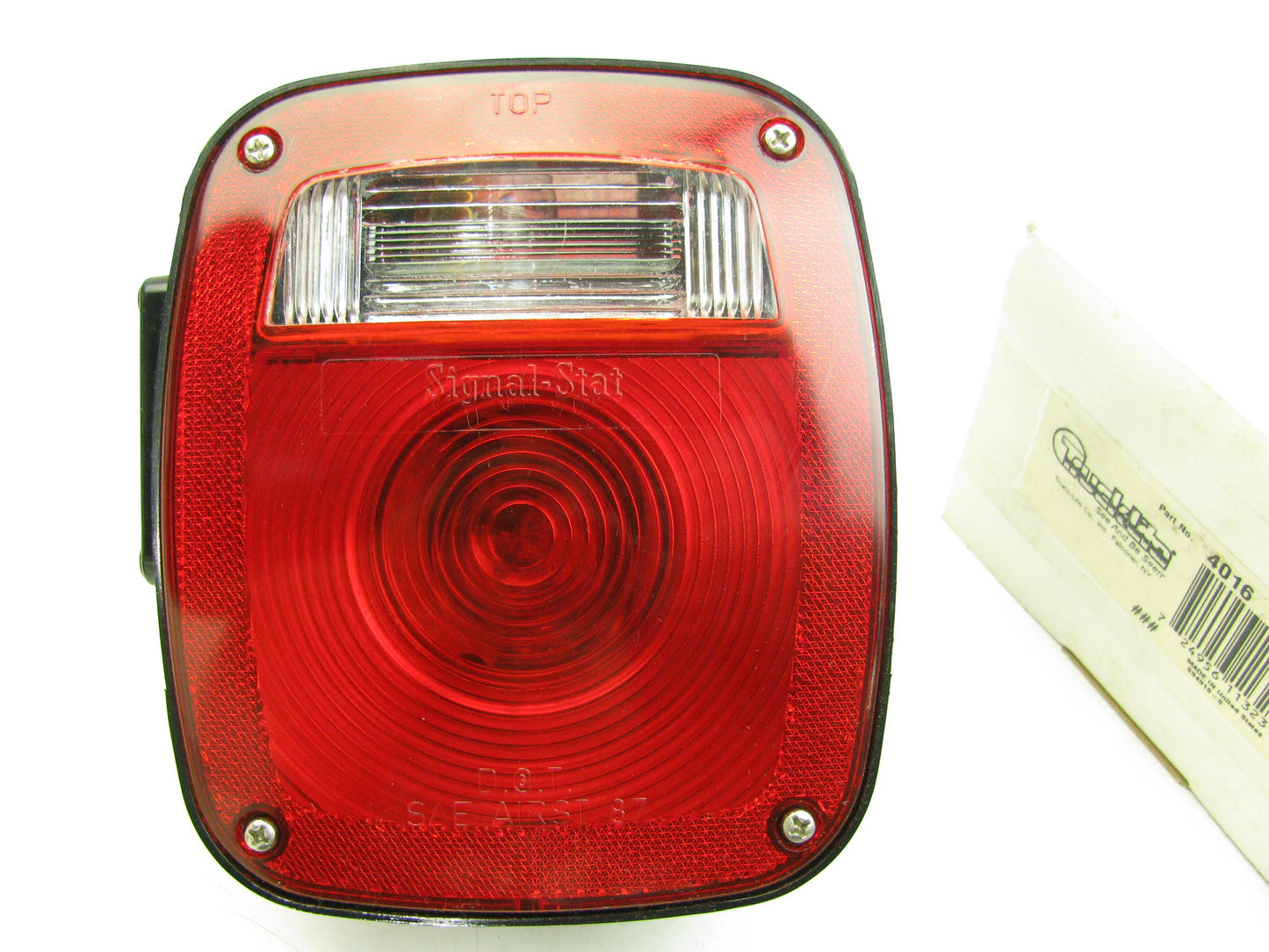 Truck-lite 4016 Universal Tail Stop Turn Light W/ License Plate Lamp