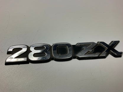 USED - Fender Emblem Badge Decal OEM For 1979-1983 Datsun 280zx