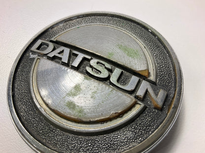 USED, One Mounting Tab Broken, Original OEM Hood Emblem For 1970-73 Datsun 240z