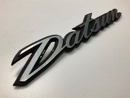 USED, 2 Broken Clips - Rear Hatch Emblem 90806-E4601 OEM For Datsun 240z 260z