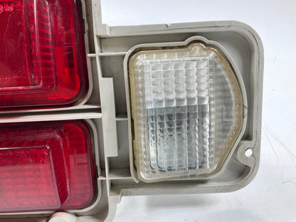 USED #628 - Left Drivers Tail Light Lamp Taillight For 74-78 Datsun 260z 280z