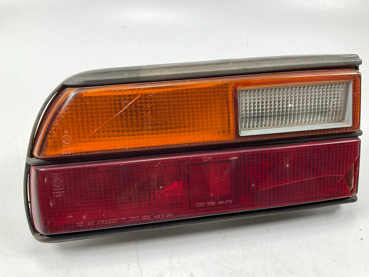 CRACKED/BROKEN, AS-SHOWN - Left Drivers Side Taillight Stop Lamp For 79-81 280zx