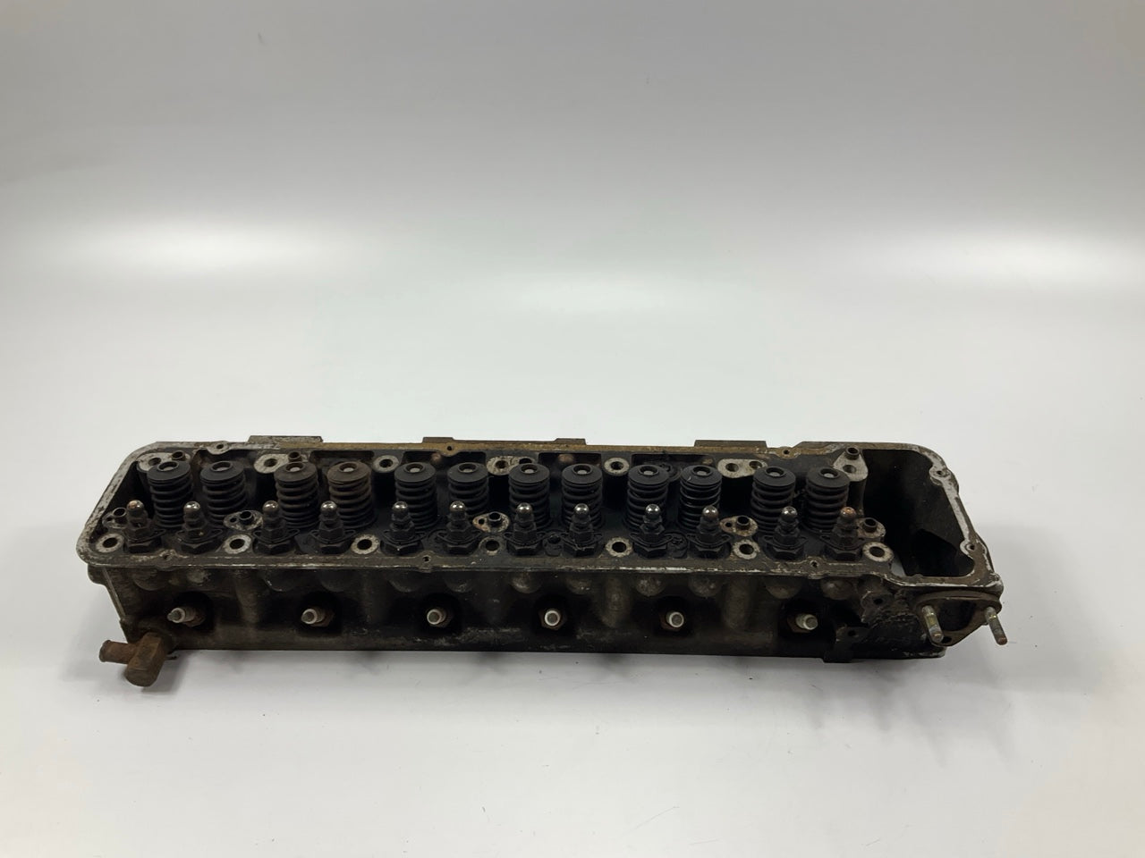 USED, BROKEN STUD - OEM For Datsun ''E88'' Core Cylinder Head COMES AS IS AS SHOWN