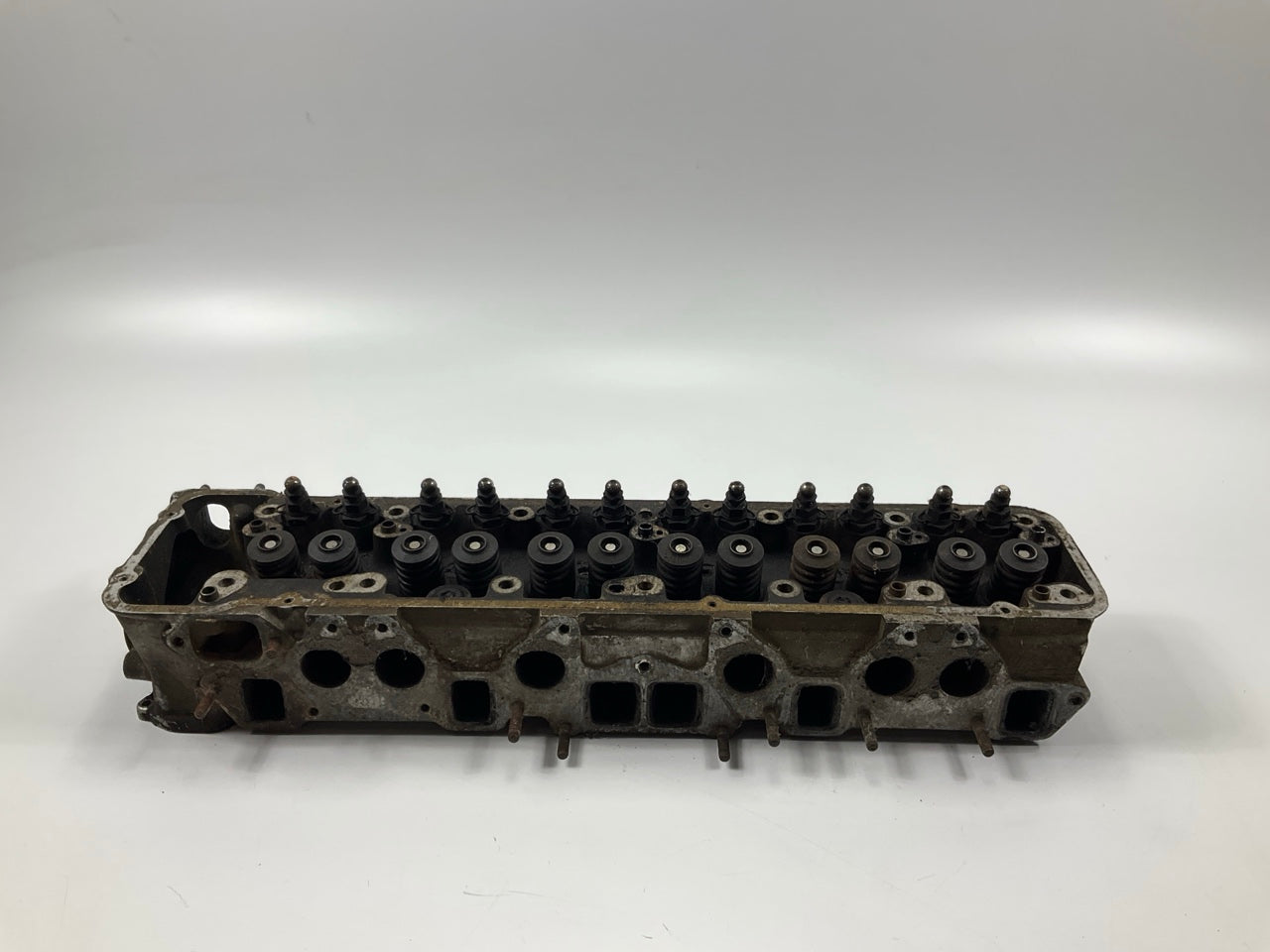 USED, BROKEN STUD - OEM For Datsun ''E88'' Core Cylinder Head COMES AS IS AS SHOWN