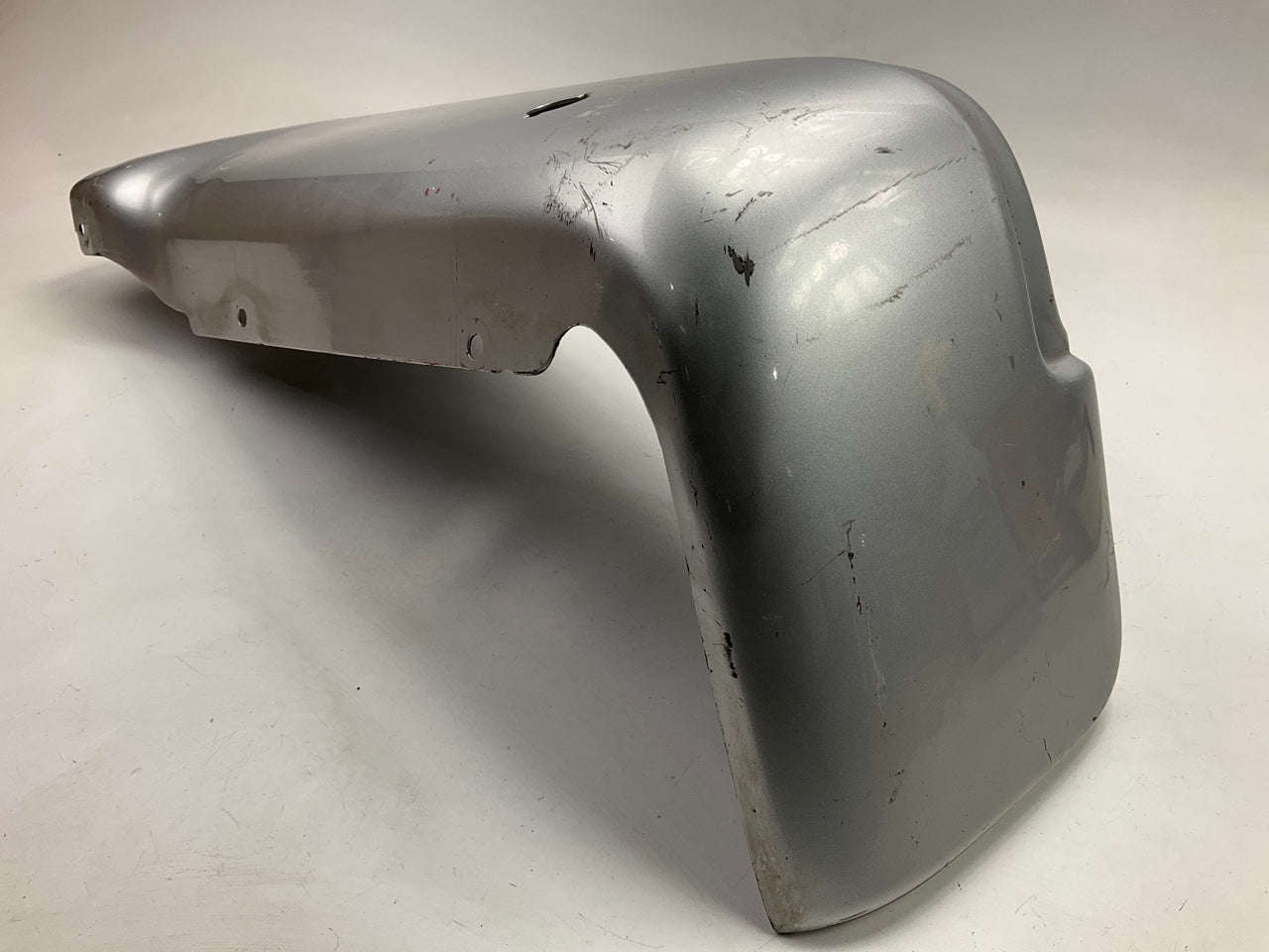 Used OEM Ford Rear Bumper Right End Cap, Silver, With Sensor Hole - 09-14 F-150