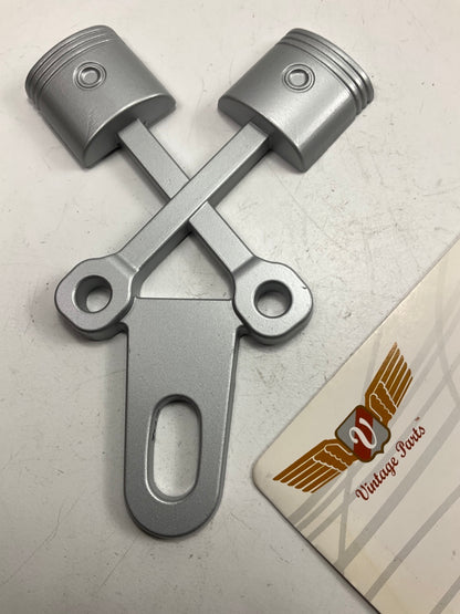 Vintage Reproduction Parts VPALPT002 Cross Pistons License Plate Topper