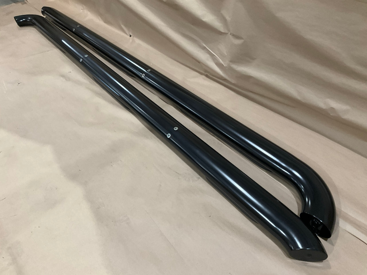 Westin 24-54325 Platinum 4 Inch Oval Wheel-to-Wheel Step Bars, Black