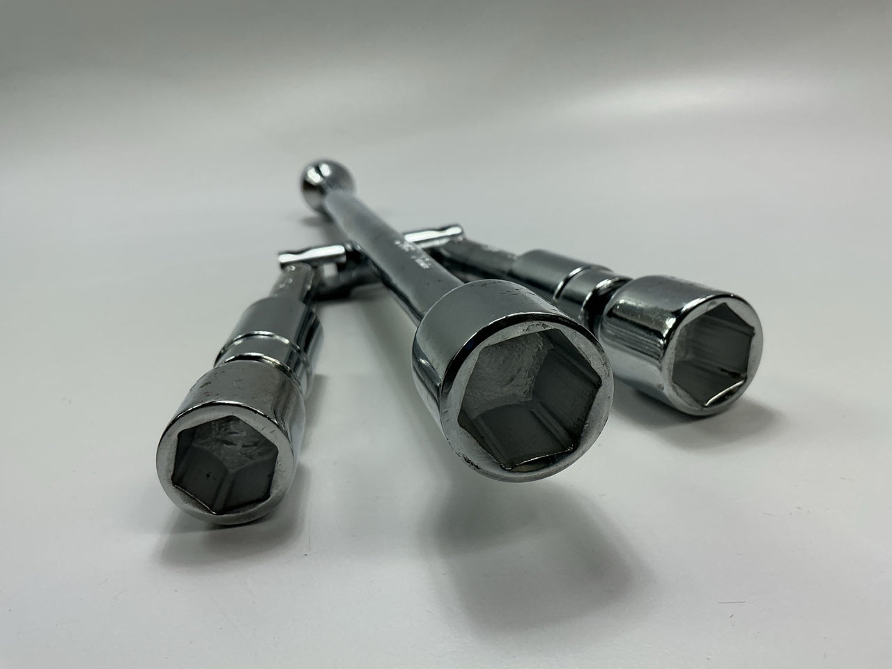 White Knight 403 Folding 4-Way Cross Lug Nut Wrench - 11/16'', 3/4'', 13/16'', 7/8''