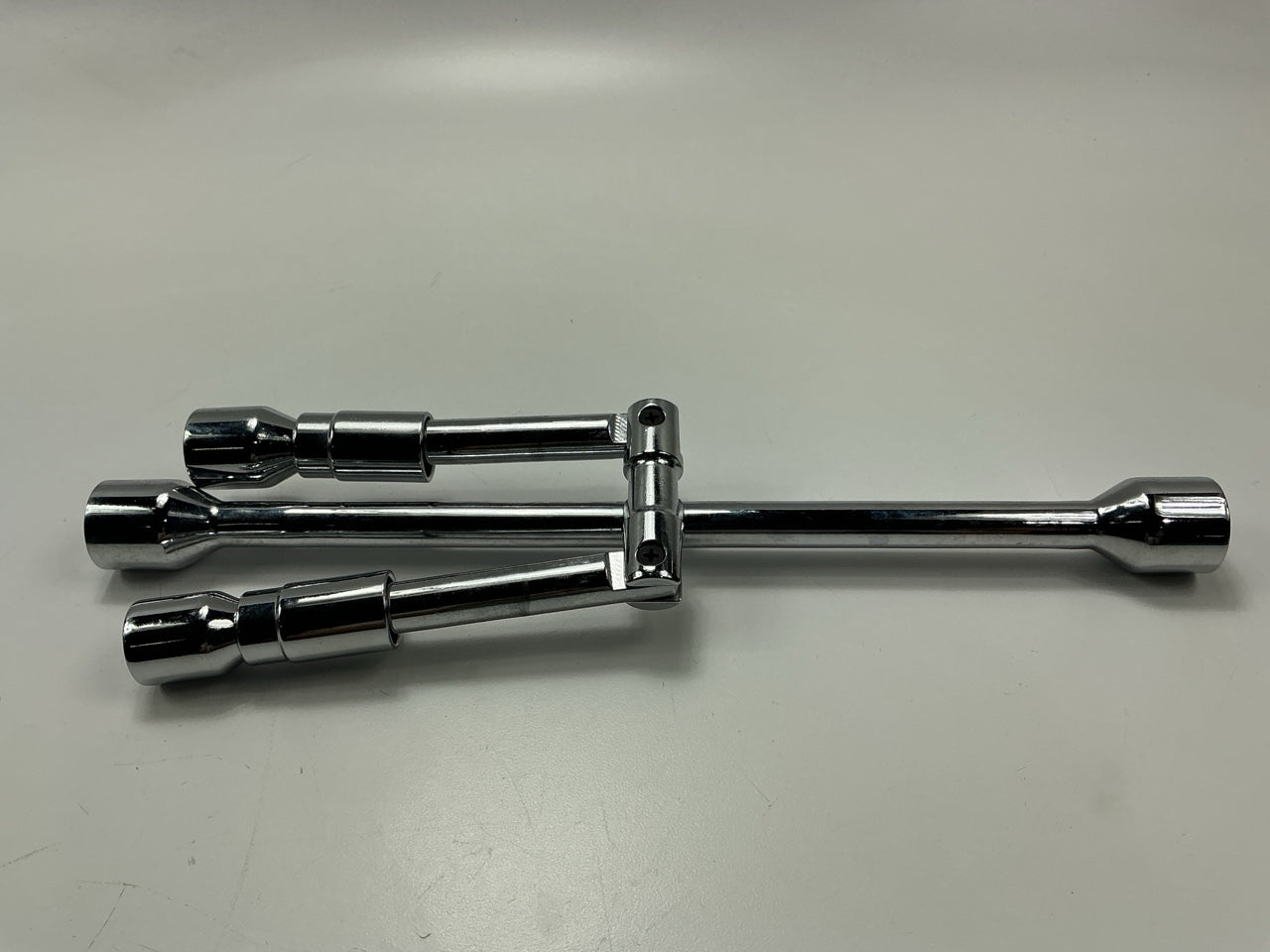 White Knight 403 Folding 4-Way Cross Lug Nut Wrench - 11/16'', 3/4'', 13/16'', 7/8''
